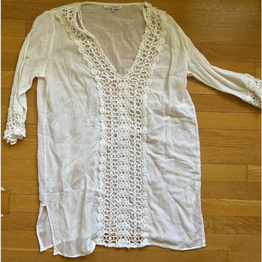 White beach coverup with crochet details